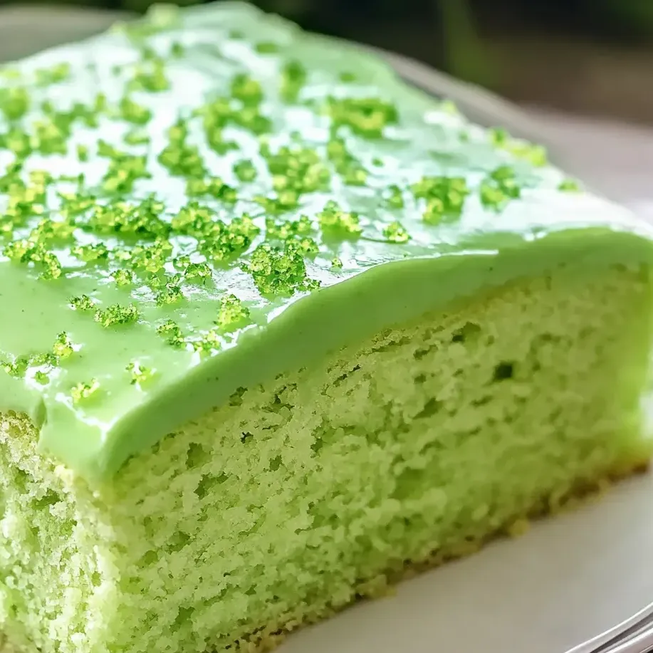 A bright green cake slice with lime frosting.