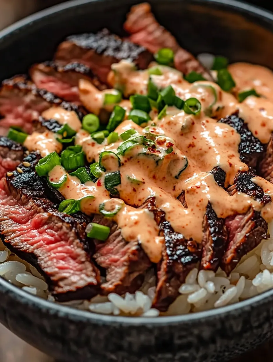 A close up of a delicious Korean BBQ steak rice bowl.