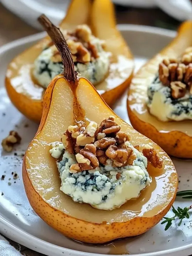 A plate of food with a pear and walnuts.