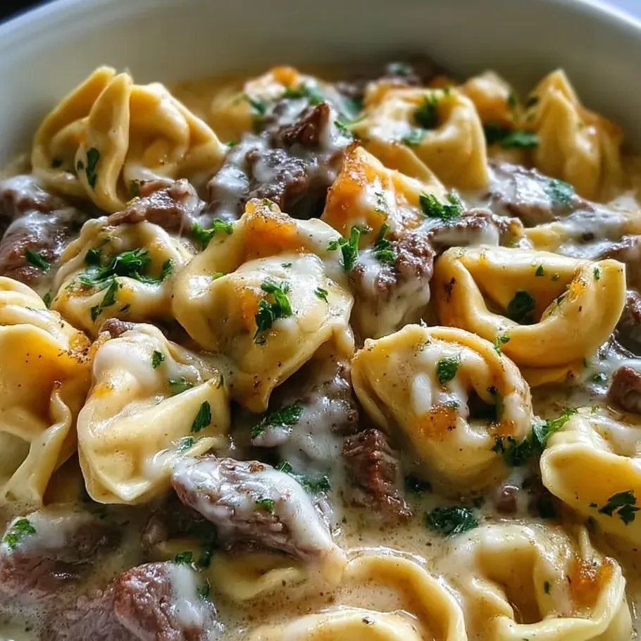 A hearty bowl of cheesesteak-inspired tortellini in a smooth provolone sauce.