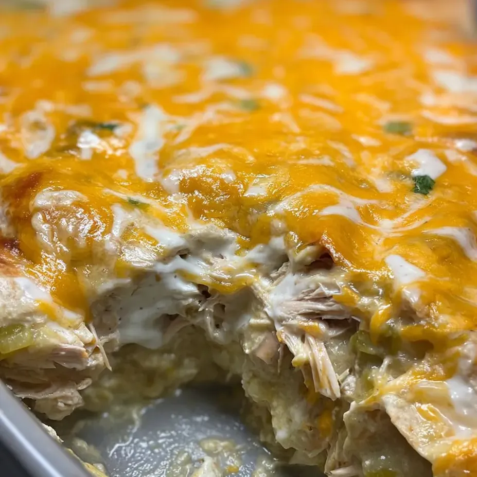 A slice of cheesy chicken casserole.