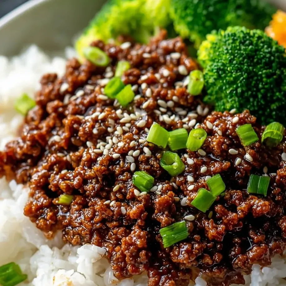 Plate loaded with beef, broccoli, and rice.