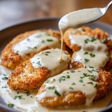 Parmesan Crusted Chicken with Creamy Garlic Sauce