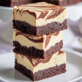 Three slices of chocolatey brownie bars.