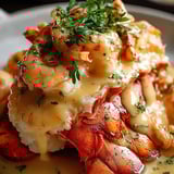 Shrimp and lobster on a plate, looking tempting.